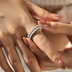 Luxurious S925 sterling silver eternity ring with emerald cut sparkling diamonds