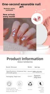 Detail view of pink gradient press-on nails with white 3D flowers and glitter accents
