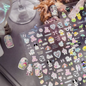 Detail of 3D embossed nail stickers featuring cute cartoon dogs and summer icons