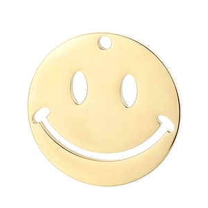 Close-up of golden round smiley face pendant with polished stainless steel finish