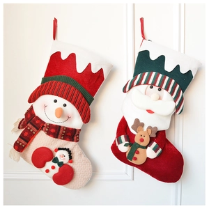 Detail of 3D knitted Christmas stockings featuring plush snowman and Santa Claus design