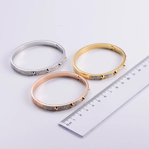 Three-piece set of nail rings in gold silver and rose gold with rhinestones and studs