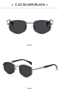 Detail of silver geometric hexagonal sunglasses with textured temples and dark lenses