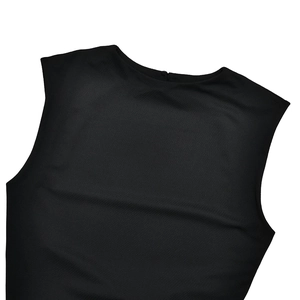 Detail shot of black sleeveless dress fabric featuring high-quality textured finish