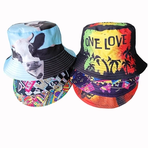 Versatile reversible graffiti bucket hats featuring various prints like cow and palm tree patterns