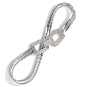 Detail of silver double-layered snake chain waist belt with rectangular metal buckles