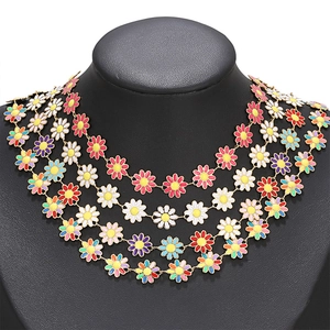 Multi-colored enamel daisy flower chain necklace on a black mannequin jewelry stand display