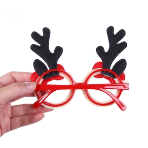 Back view of Christmas reindeer antler glasses with red frames and plush ball details