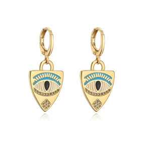 Detailed view of evil eye triangle earrings with blue enamel and sparkling zircons