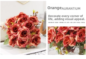 Detailed view of artificial orange roses with layered petals and realistic green leaves