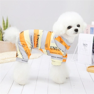 Detail view of British style striped pet pajamas for small dogs in orange and grey