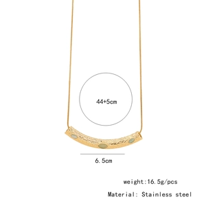 Detailed view of irregular gold stainless steel necklace with green stones and dimensions