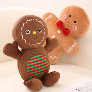 Close-up of brown plush gingerbread man doll pillows on a cozy sofa for Christmas