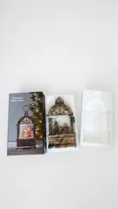 Detailed view of the Christmas water lamp packaging and secure protective foam inserts