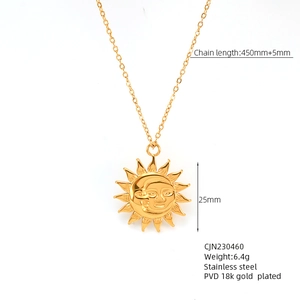 Detail showing 18k gold plated sun and moon clover pendant with product dimensions
