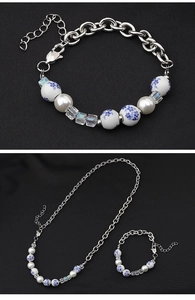 Detail of Chinese style necklace and bracelet with blue porcelain beads and pearls