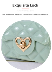 Detail of mint green quilted mini bag featuring a gold heart-shaped metal lock