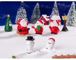 Miniature Christmas resin figurines of Santa and snowmen for DIY festive decor