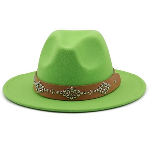 Detailed view of neon green wool fedora with brown studded leather belt decoration