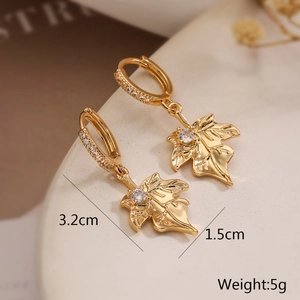 Macro detail of leaf pendant earrings with size 3.2cm by 1.5cm and weight 5g specs