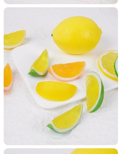 Realistic PVC lemon and orange fruit slices with textured peel for display and props