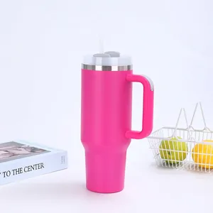 Macro detail of the pink stainless steel 40oz insulated tumbler with handle and straw hole
