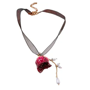 Vintage lace choker necklace with red dried rose resin pendant and pearl tassels