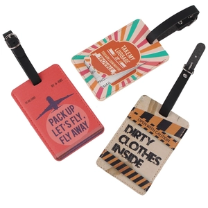 Three premium PU leather luggage tags with travel slogans and secure black buckle straps