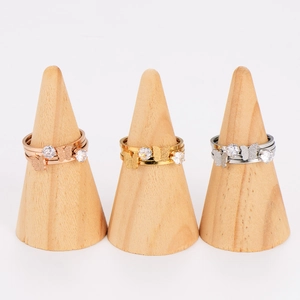 Multi-layer butterfly rings in gold, rose gold, and silver finishes with zircon stones