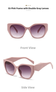 Detail of pink cat-eye sunglasses featuring geometric temples and gradient grey lenses