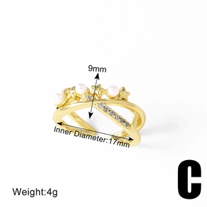 Detail view of gold pearl ring with 17mm inner diameter and star pattern dimension specs