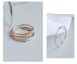 Close-up of S925 sterling silver stamp on minimalist stackable zircon rings