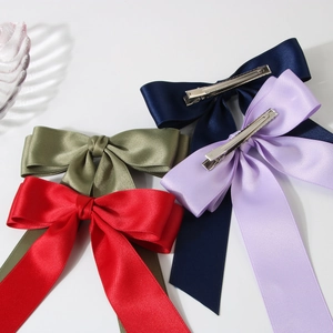 Set of four 4cm double-layer satin bow hair clips in red, green, blue, and purple colors