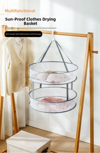 Close-up of double-layer mesh laundry drying basket with hook for delicate knitwear