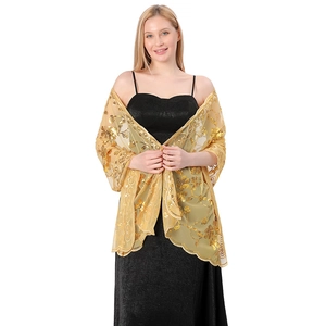 Elegant gold sequin embroidered mesh shawl worn by a model for party evening wear.