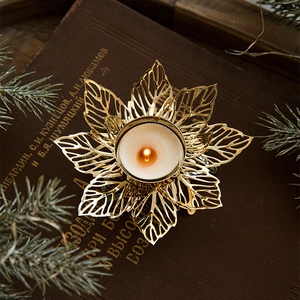 Golden leaf iron candle holder with tea light for festive Christmas table decor