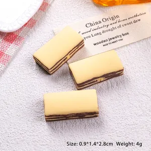 Macro view of miniature resin chocolate wafer cake charms with size 0.9x1.4x2.8cm