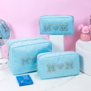 Three-piece light blue chenille letter MOM embroidered makeup bag set with gold zippers