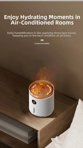 Detail of creative volcano humidifier with lava light and digital display on nightstand
