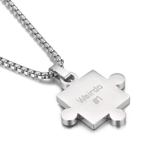 Polished stainless steel puzzle piece necklace with Weirdo #1 engraving for couples
