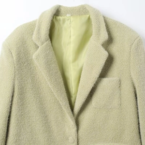 Stijlvolle limegroene damesblazer van tweedstof met textuur en zijdeachtige voering
