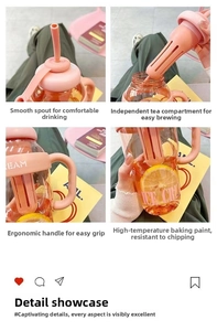 Detailed view of pink water bottle with handle, straw, built-in tea infuser and ice cream print