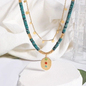 Bohemian gold layered necklace with turquoise beads and gemstone oval pendant