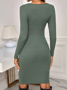 Detail of sage green knitted maternity dress showing slim fit texture and back view