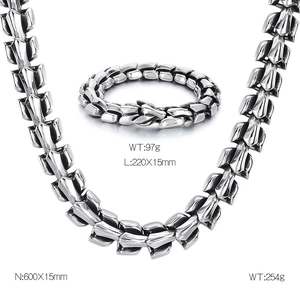Detailed view of silver stainless steel dragon scale bracelet and necklace with measurements