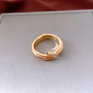 French retro style gold oval striped open ring with white zircon stones for women
