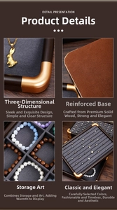 Detail of walnut wood jewelry tray with gold metal corners and velvet ring inserts