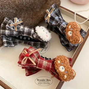 Cute plaid fabric bow hair clips with plush bears and hearts in vintage sweet style