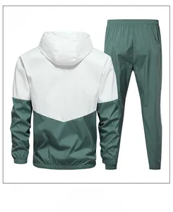 Rear view of men's hooded sports tracksuit with light green and white color block design