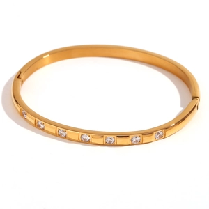 18K gold plated stainless steel bangle with micro-set zircons and secure clasp